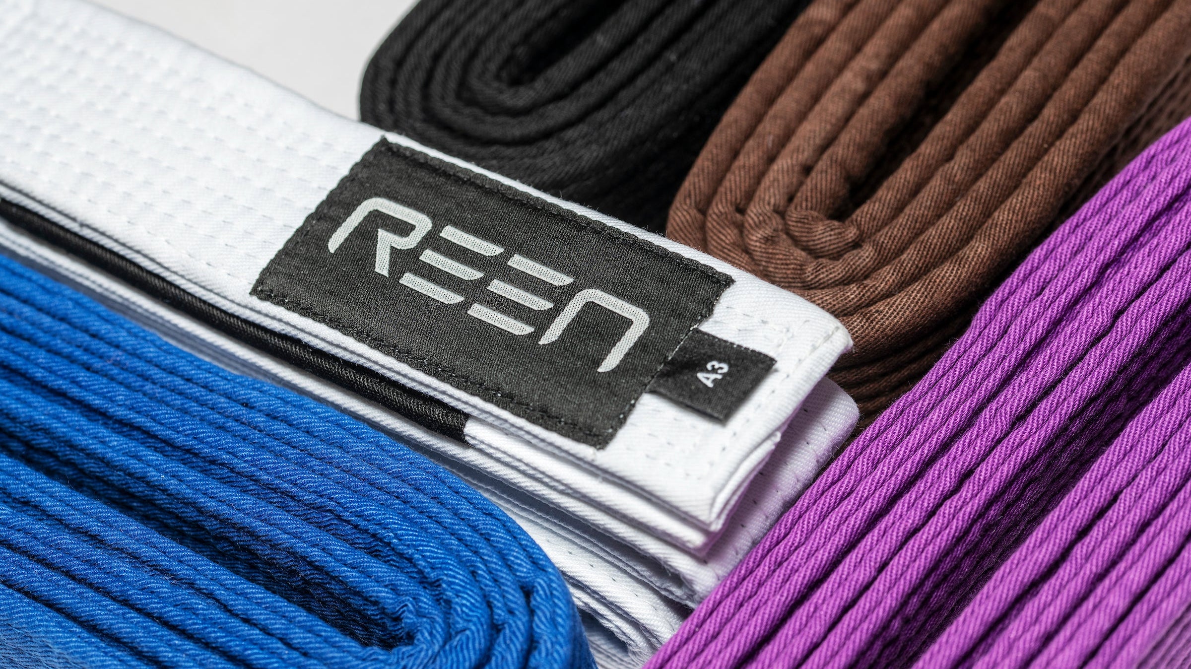 Survive, Escape, Improve: The Beginner’s Game Plan for Rolling in BJJ